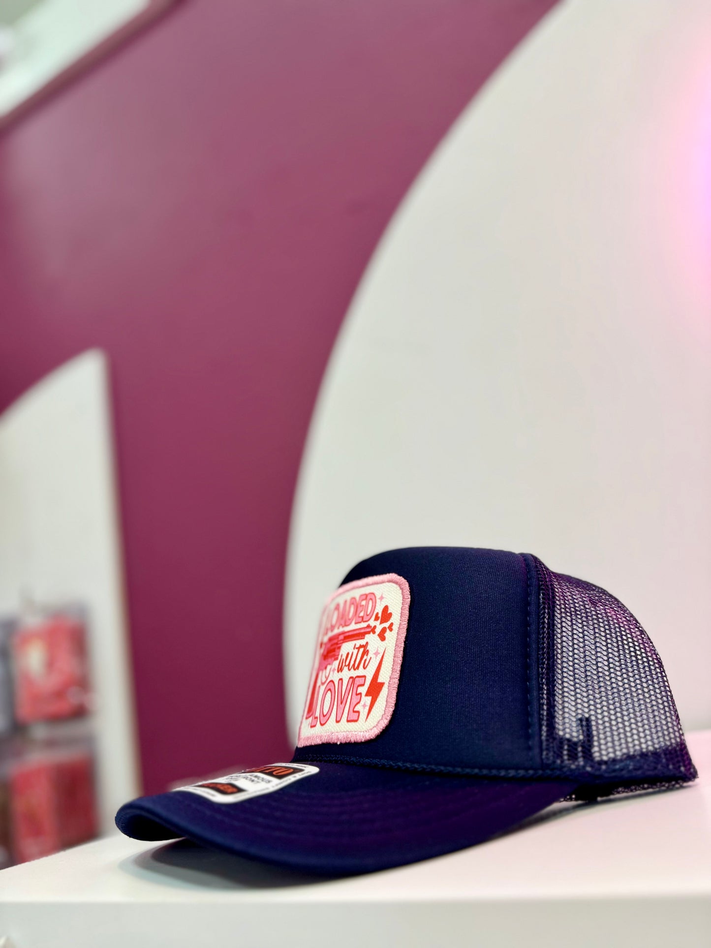 Loaded with Love – One-of-One Trucker Hat